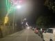 Il viale dei tigli all'ingresso di Martirano Lombardo illuminato da luminarie tricolori in una sera d'estate